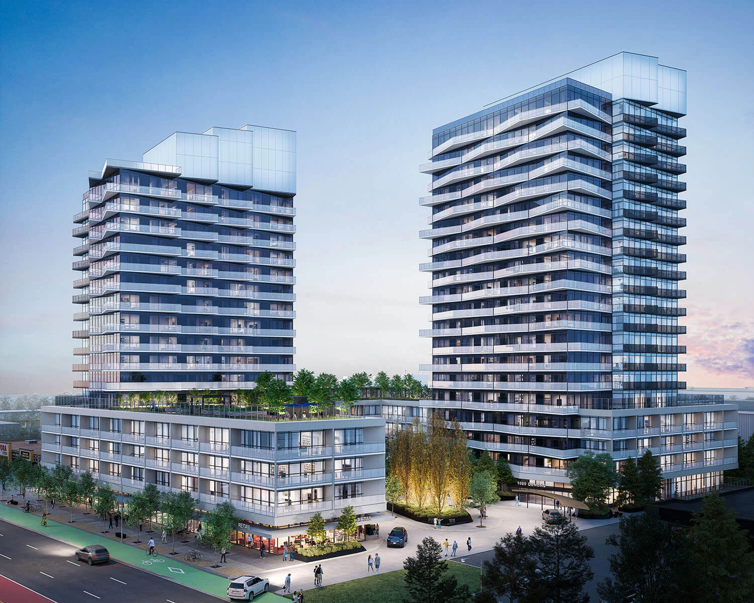 Mississauga rental development showcasing modern architecture by Ahmed Group at dusk.