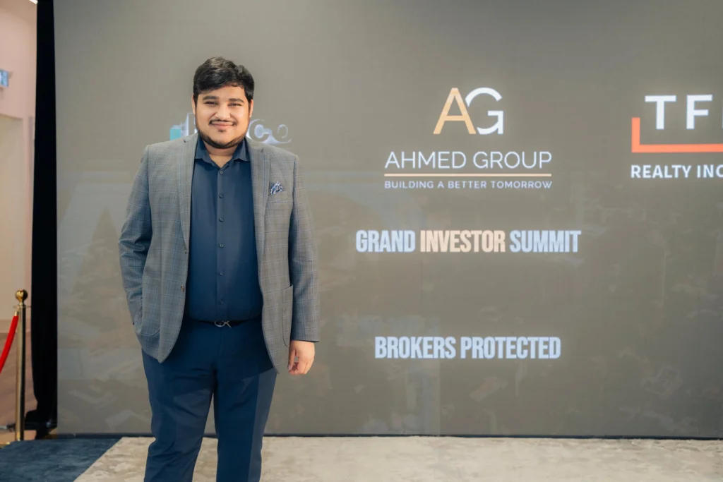 Team member at Ahmed Group's Grand Investor Summit in Mississauga.