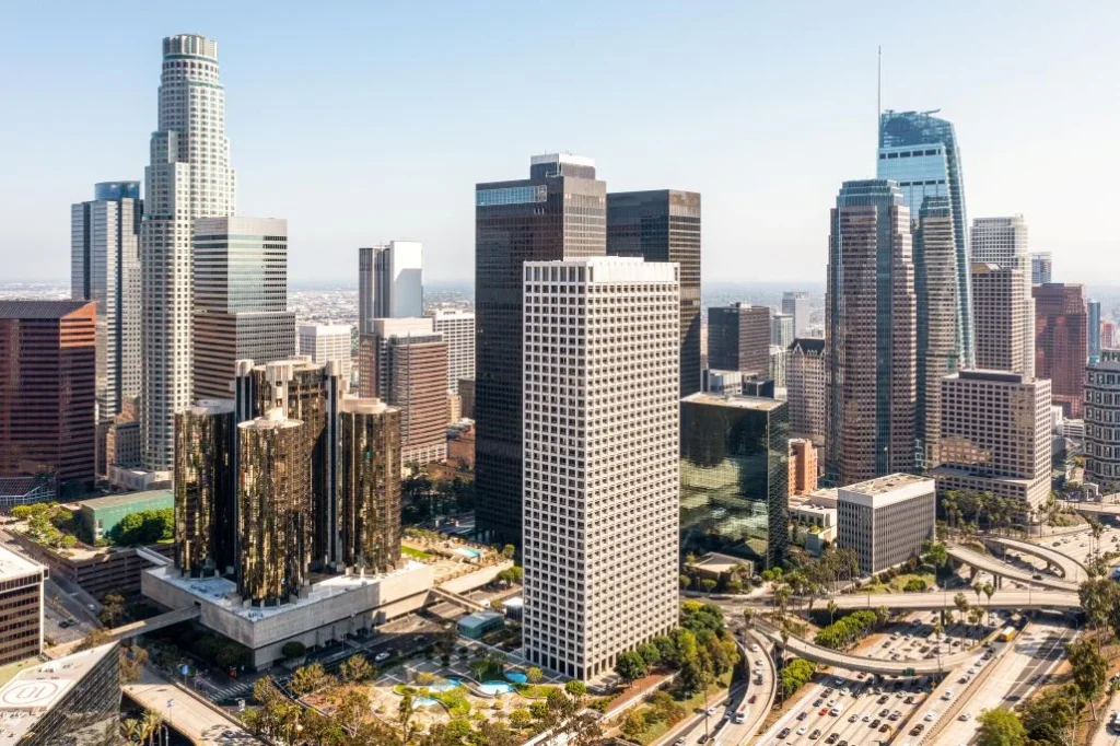Aerial view of downtown skyscrapers, promoting Shariah-compliant real estate investment in Canada.
